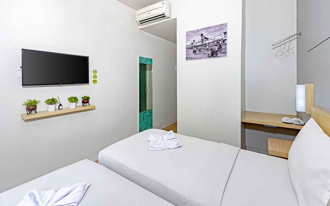 Tempat Tidur Deluxe Twin di IXO Hotel Bekasi
